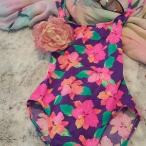 One piece swim / Surf beyond sz small. Small tears